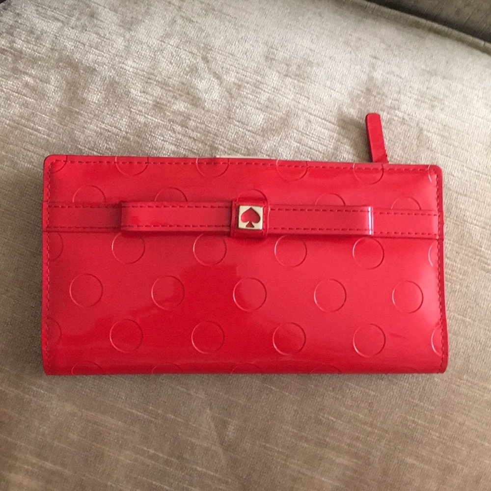 Red Kate Spade polka dot wallet